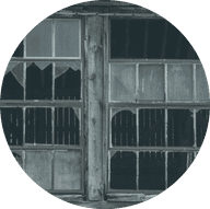 Photo of a window with broken panes